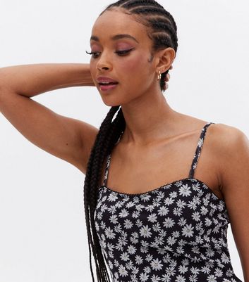 Click to view product details and reviews for Black Daisy Mesh Strappy Mini Dress New Look.