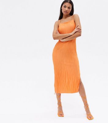 Click to view product details and reviews for Bright Orange Pleated Satin Midi Slip Dress New Look.