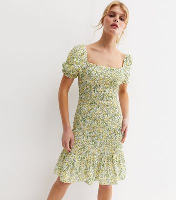 Click to view product details and reviews for Yellow Ditsy Floral Shirred Tiered Mini Dress New Look.