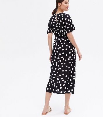 Dotted wrap skirt flutter clearance dress