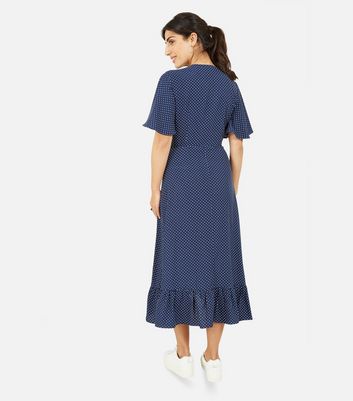 Click to view product details and reviews for Mela Blue Spot Frill Midi Wrap Dress New Look.