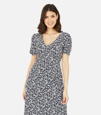 Click to view product details and reviews for Mela Black Floral V Neck Midi Dress New Look.