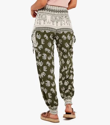 Click to view product details and reviews for Apricot Green Elephant High Waist Joggers New Look.