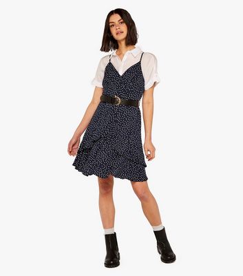 Click to view product details and reviews for Apricot Navy Spot Strappy Mini Wrap Dress New Look.