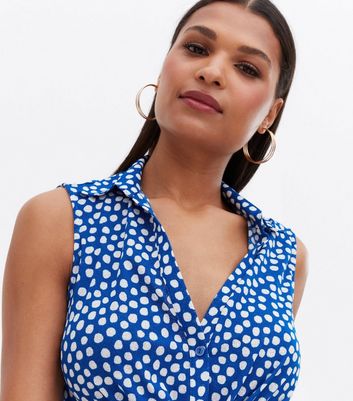 Click to view product details and reviews for Blue Spot Collared Twist Front Sleeveless Blouse New Look.