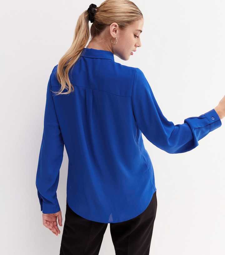 bright blue long sleeve shirt