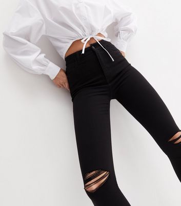 Black pants store with ripped knees