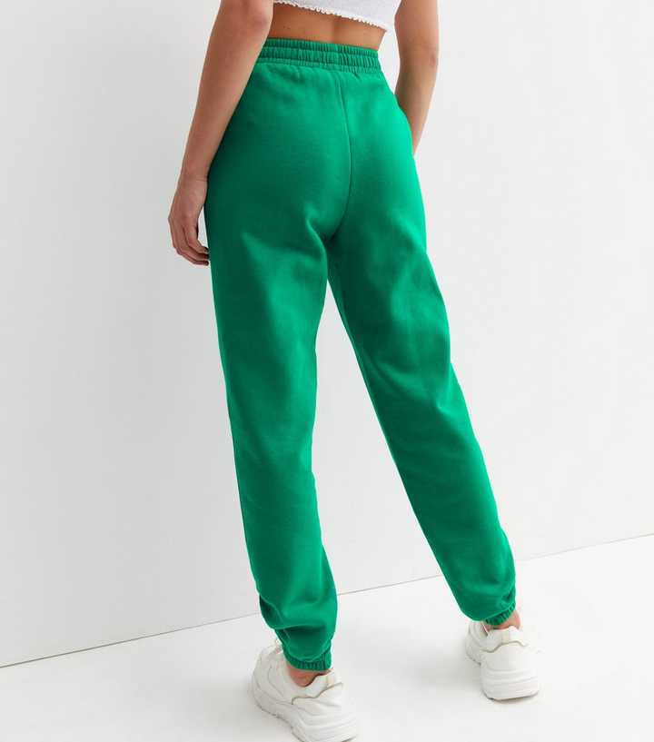 https://media3.newlookassets.com/i/newlook/838407730M3/womens/clothing/trousers/green-jersey-cuffed-joggers.jpg?strip=true&qlt=50&w=720