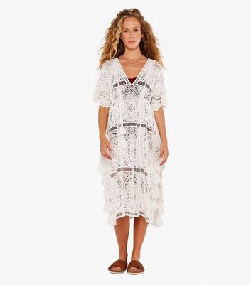Click to view product details and reviews for Apricot White Crochet Midi Kaftan Dress New Look.