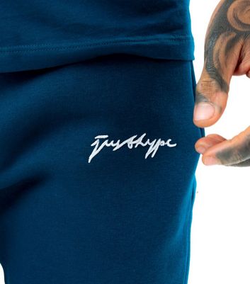 Herrenmode Bekleidung für Herren HYPE Mens Teal Scribble Logo Joggers Herrenmode Bekleidung für Herren HYPE Mens Teal Scribble Logo Joggers