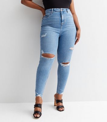 Skinny blue ripped jeans 2024 womens