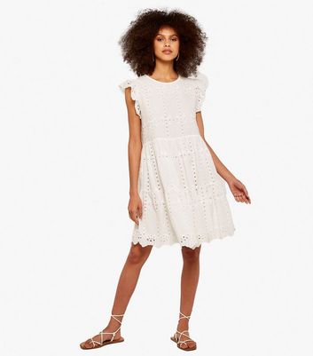 Click to view product details and reviews for Apricot Cream Broderie Mini Smock Dress New Look.