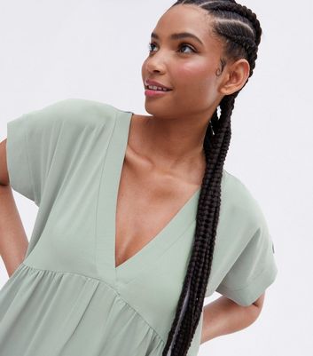 Click to view product details and reviews for Blue Vanilla Light Green Tiered Midi Smock Dress New Look.