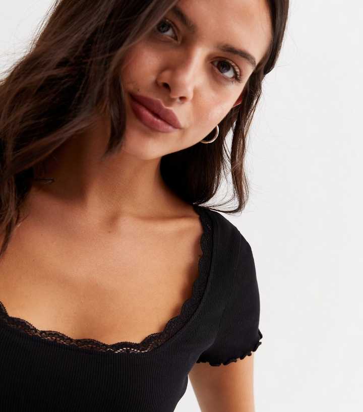 https://media3.newlookassets.com/i/newlook/840935401/womens/clothing/tops/black-lace-trim-frill-scoop-neck-t-shirt.jpg?strip=true&qlt=50&w=720