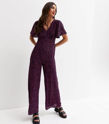 Low back jumpsuit new deals look