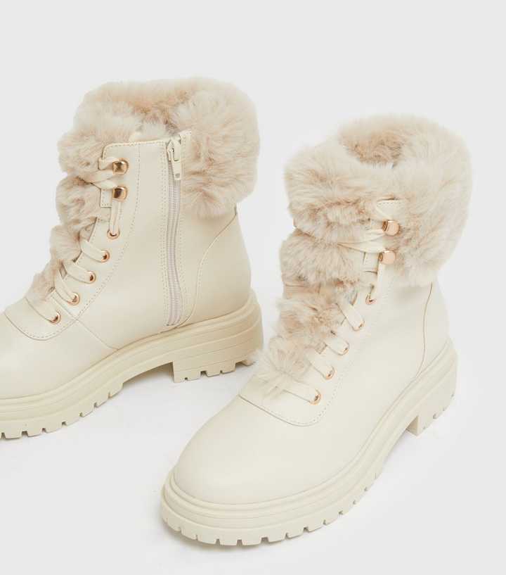 white faux fur boots