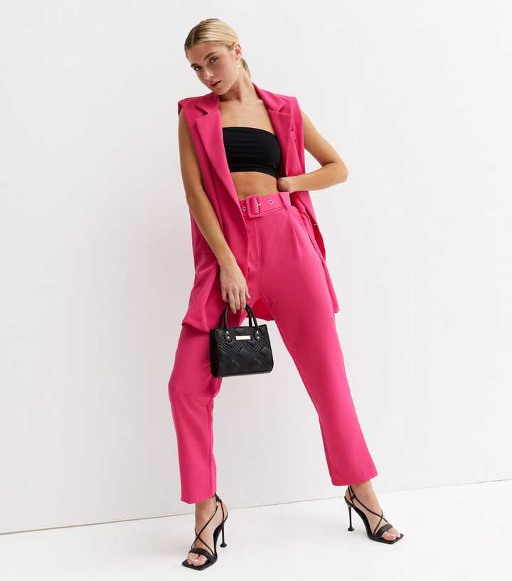 https://media3.newlookassets.com/i/newlook/842725176/womens/clothing/trousers/urban-bliss-bright-pink-belted-trousers.jpg?strip=true&qlt=50&w=720