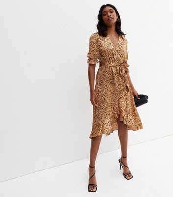 Faithfull leopard wrap sales dress