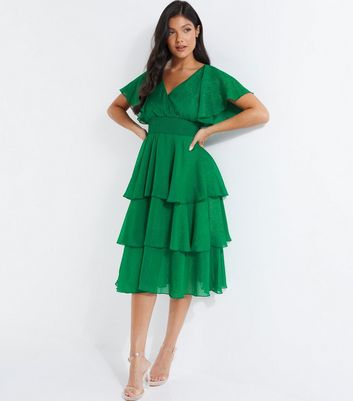 Quiz bottle green glitter shops dip hem dress