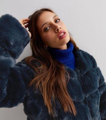 blue faux fur coat with hood