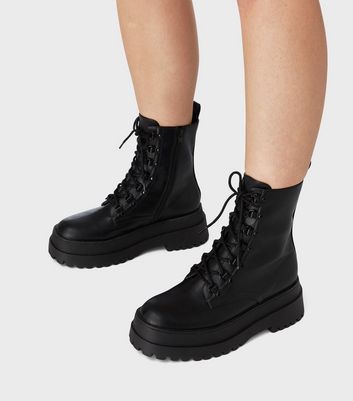 Lace up store chunky black boots