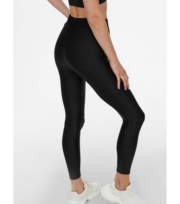 Super-shiny tight black leggings. Almost lickable. | Spandex girls, Shiny  leggings, Latex pants