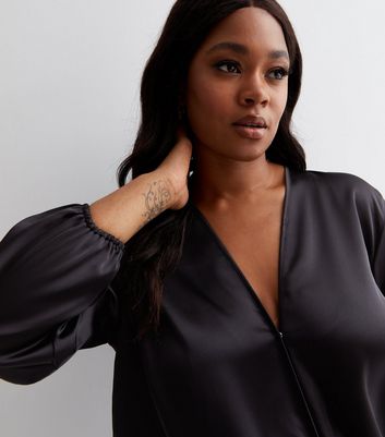 Black satin long store sleeve top