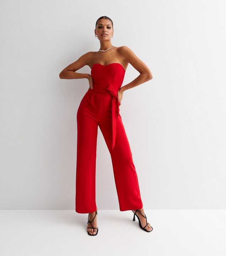 https://media3.newlookassets.com/i/newlook/846617560/womens/clothing/playsuits-jumpsuits/red-bandeau-tie-side-wide-leg-jumpsuit.jpg?strip=true&qlt=50&w=720