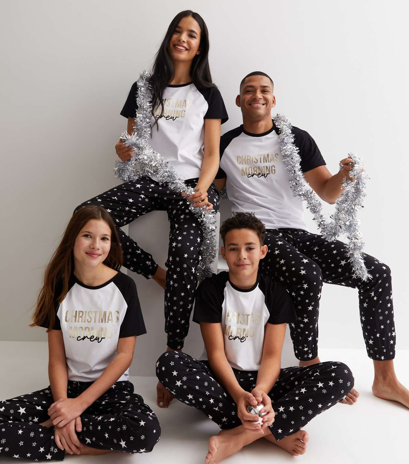 Girls Black Family Christmas Jogger Pyjama Set with Star Print