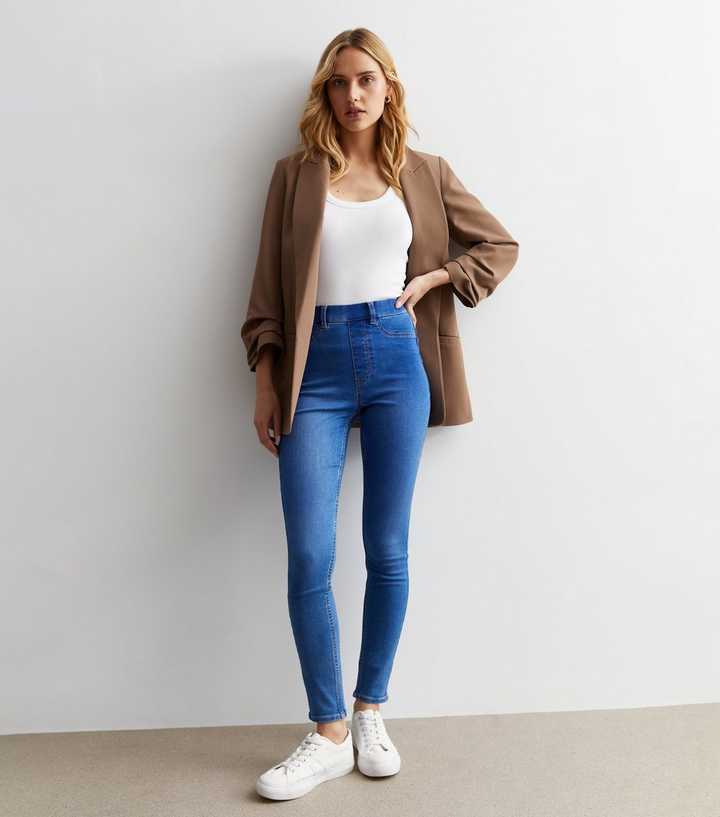 https://media3.newlookassets.com/i/newlook/847385746/womens/clothing/jeans/bright-blue-mid-rise-lift-shape-emilee-jeggings.jpg?strip=true&qlt=50&w=720