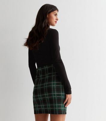 navy and green check skirt