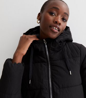 tall black long puffer coat