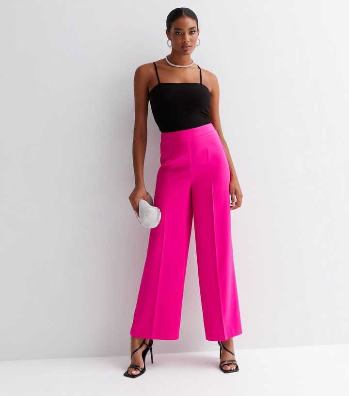 https://media3.newlookassets.com/i/newlook/849283276/womens/clothing/trousers/bright-pink-satin-high-waist-wide-leg-trousers.jpg?strip=true&qlt=50&w=720