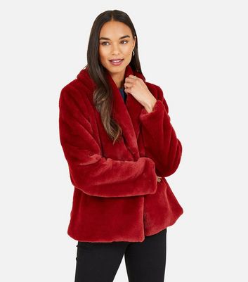 red faux fur shrug