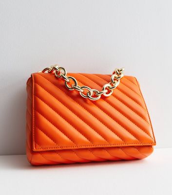 Bright Orange Diagonal Quilted Cross Body Bag New Look