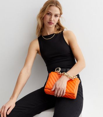 Bright Orange Diagonal Quilted Cross Body Bag New Look