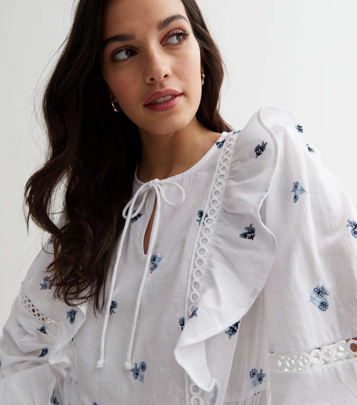 White Floral Embroidered Frill Tie Neck Peplum Blouse