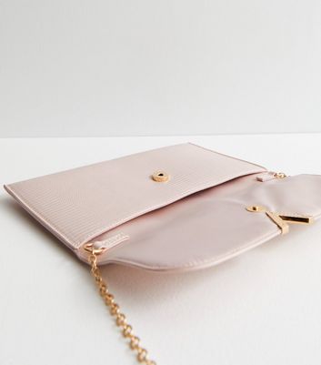 Large cream deals clutch bag