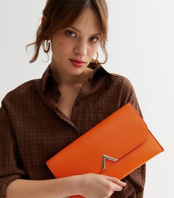 Large orange sale clutch bag