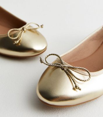 Girls gold 2025 ballet pumps