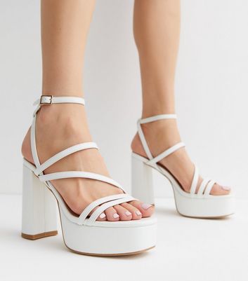 White store platform pumps