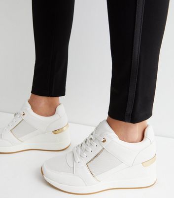 Heeled sales wedge trainers