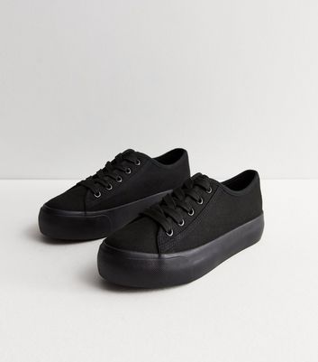 All black 2025 canvas trainers