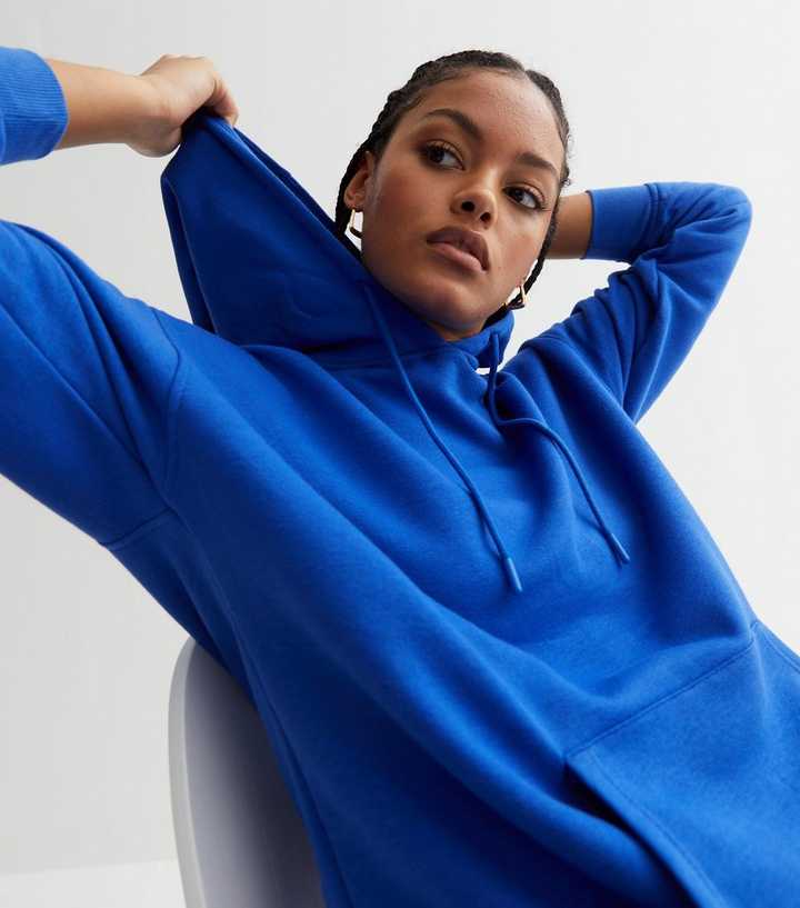 https://media3.newlookassets.com/i/newlook/853823943/womens/clothing/hoodies-sweatshirts/bright-blue-pocket-front-hoodie.jpg?strip=true&qlt=50&w=720