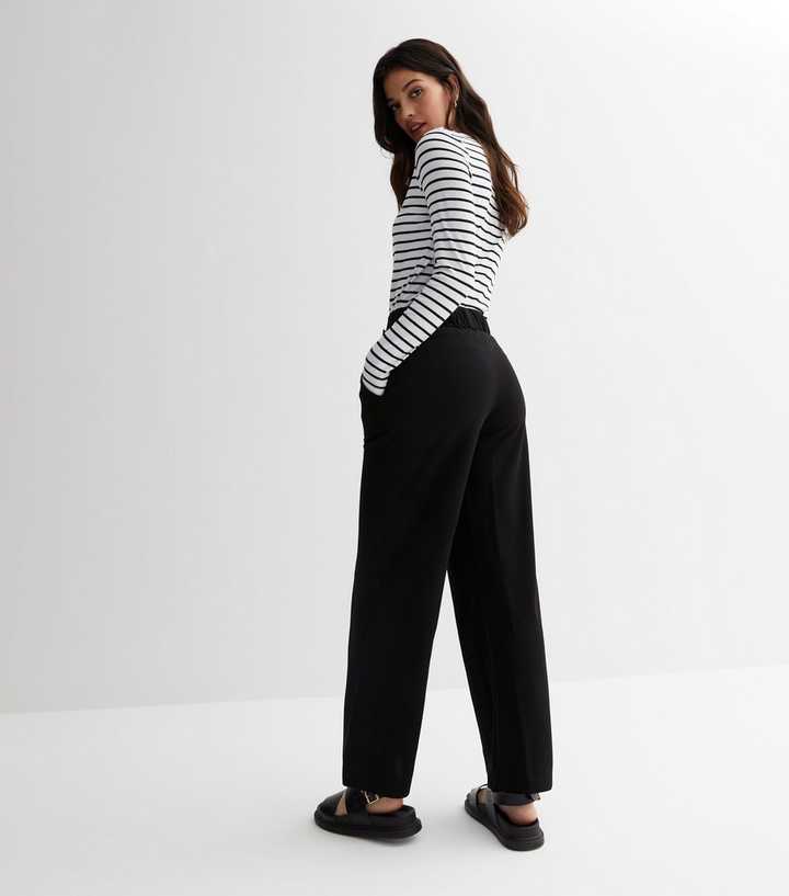 JDY jersey flared pants with button front in black