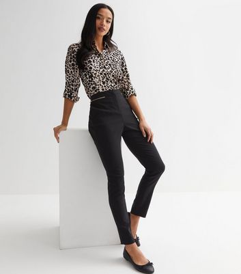 Black fold-over tapered trousers - women - JW ANDERSON -  divincenzoboutique.com