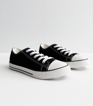 black trainers white stripe
