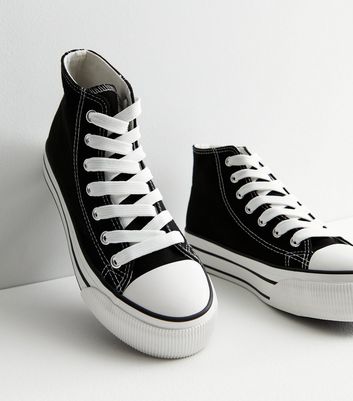 White high top hot sale converse with black stripe