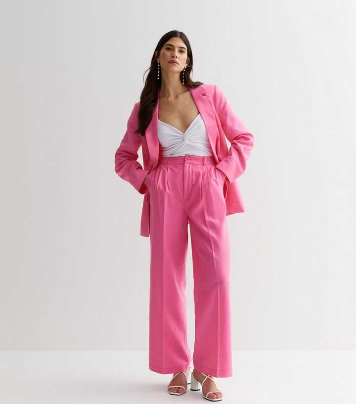 https://media3.newlookassets.com/i/newlook/855340276/womens/clothing/trousers/bright-pink-linen-blend-formal-wide-leg-trousers.jpg?strip=true&qlt=50&w=720