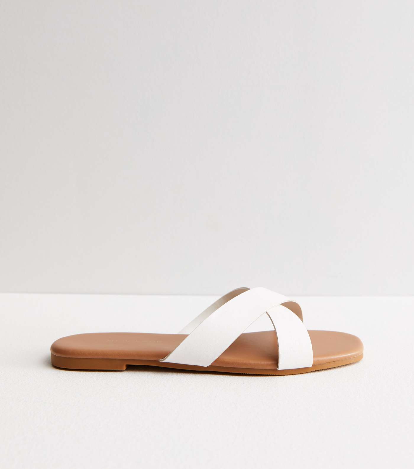 White Leather-Look Cross Strap Sliders